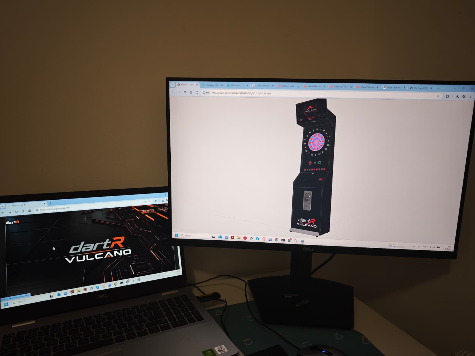 Laptop and external monitor showing the dartR website and a 3D render of the Vulcano cabinet