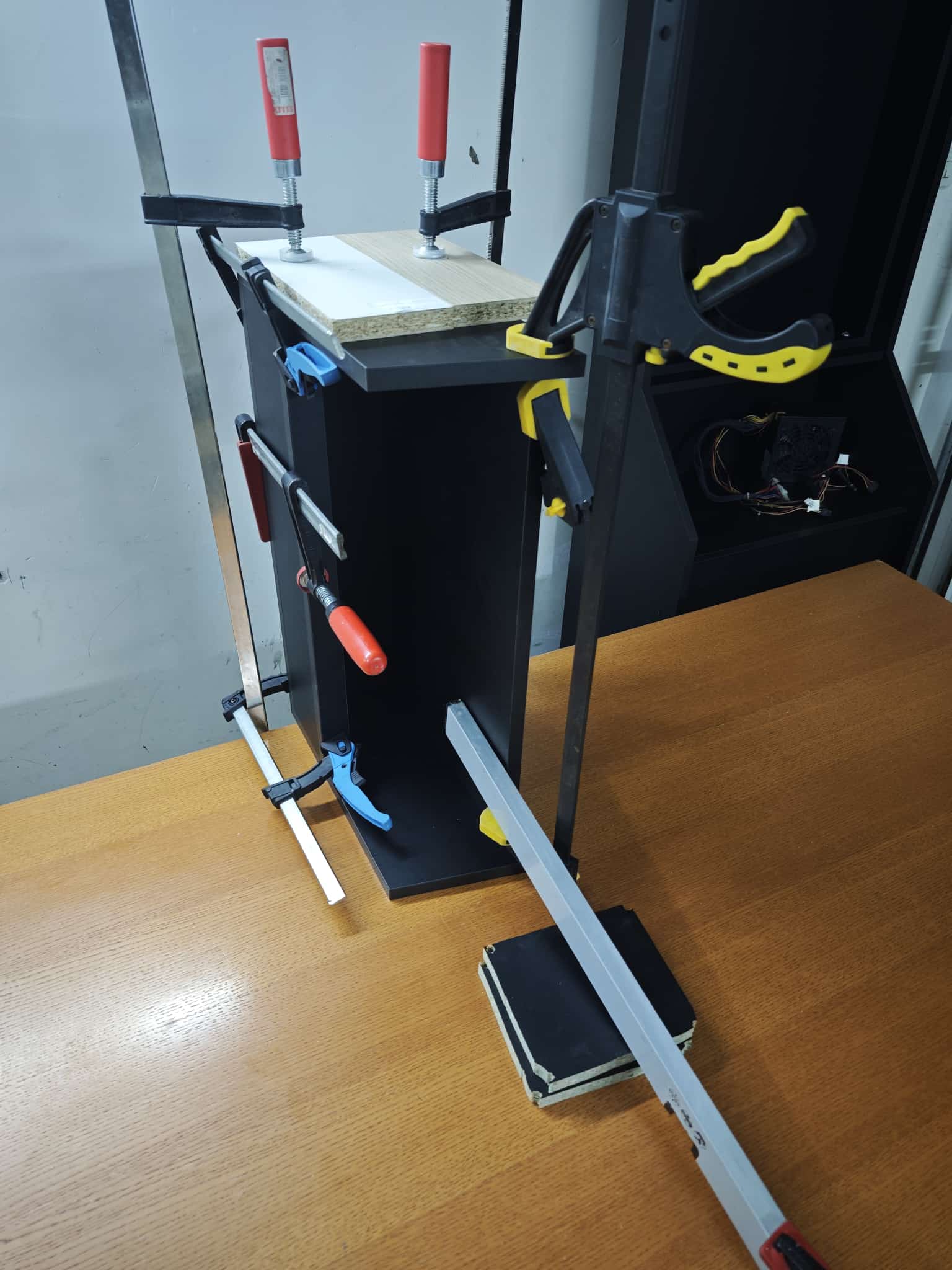 Vulcano top section held together by clamps while the glue sets